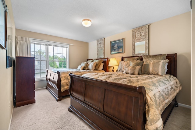 1433 Bicentennial Pkwy, Ann Arbor, MI 48108 - bedroom featuring light colored carpet and baseboards