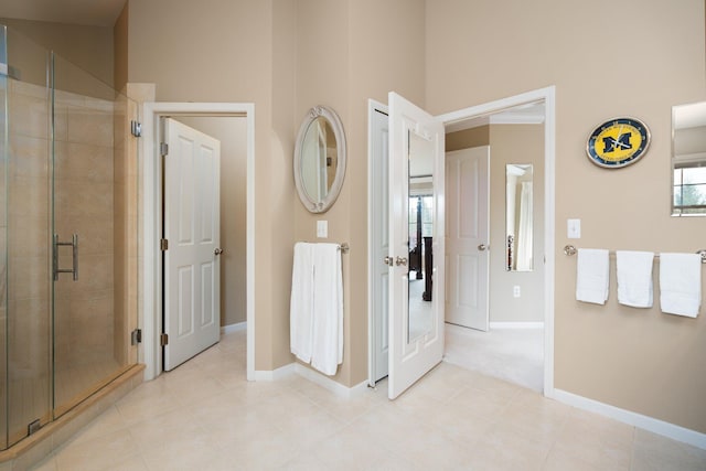 1433 Bicentennial Pkwy, Ann Arbor, MI 48108 - full bathroom featuring a shower stall, baseboards, and tile patterned floors