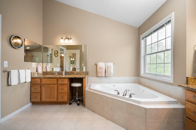 1433 Bicentennial Pkwy, Ann Arbor, MI 48108 - full bath with vanity, vaulted ceiling, a bath, and tile patterned floors