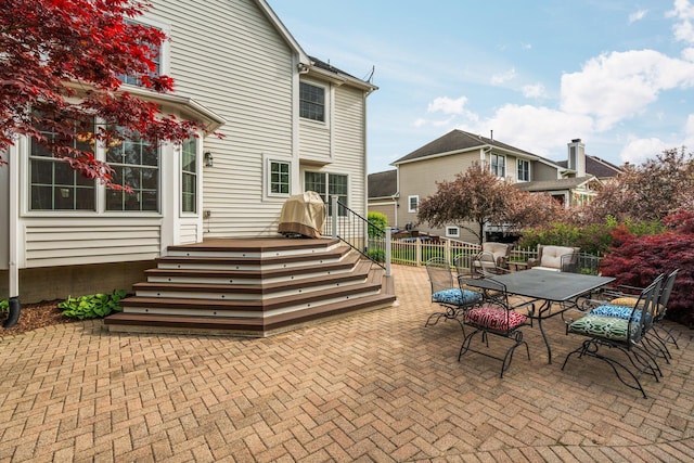 1433 Bicentennial Pkwy, Ann Arbor, MI 48108 - view of patio with outdoor dining space, a deck, and fence