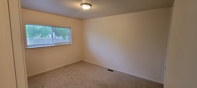21276 Abrahm St, Clinton Township, MI 48035 - carpeted spare room featuring baseboards