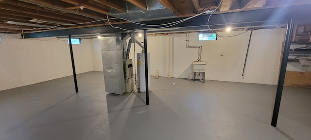 21276 Abrahm St, Clinton Township, MI 48035 - basement featuring water heater and heating unit