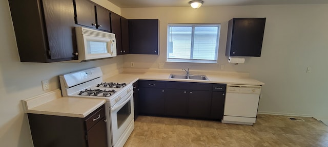 21276 Abrahm St, Clinton Township, MI 48035 - kitchen featuring white appliances, a sink, and light countertops