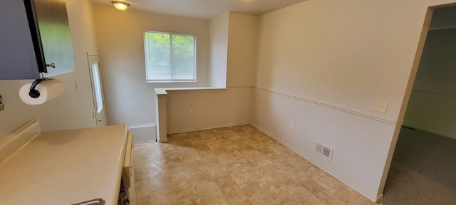 21276 Abrahm St, Clinton Township, MI 48035 - unfurnished dining area featuring baseboards