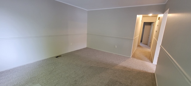 21276 Abrahm St, Clinton Township, MI 48035 - empty room featuring carpet floors, crown molding, and baseboards
