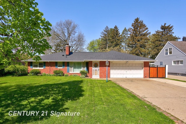1415 Coolidge Ave, Saginaw, MI 48638 - view of front of house with an attached garage, brick siding, driveway, and a chimney