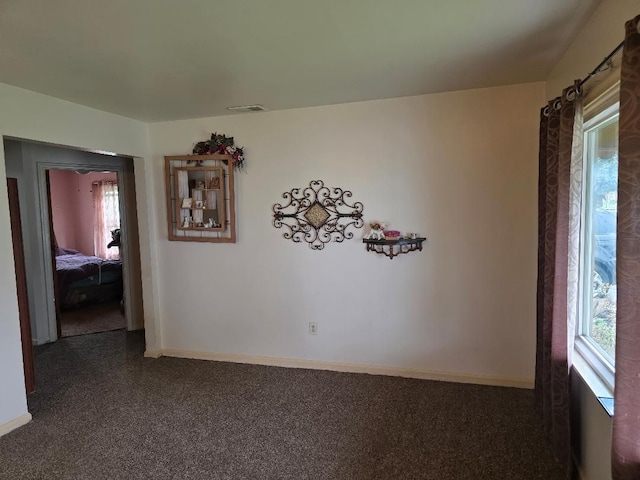 28465 John Hauk St, Garden City, MI 48135 - empty room with plenty of natural light, carpet floors, and baseboards