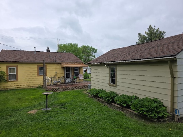 28465 John Hauk St, Garden City, MI 48135 - rear view of house featuring a yard and a patio area