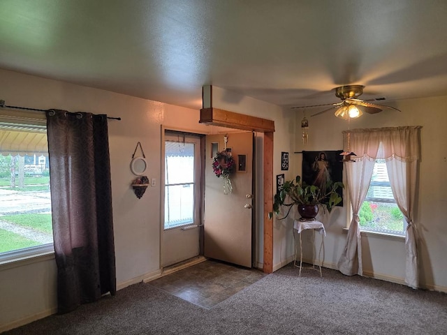 28465 John Hauk St, Garden City, MI 48135 - carpeted entrance foyer featuring a ceiling fan and baseboards
