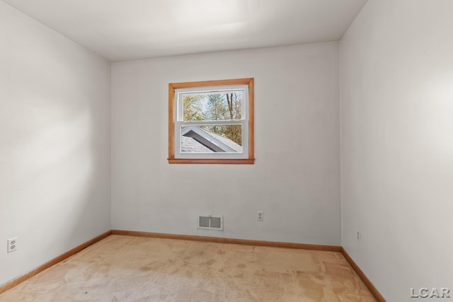 601 N Occidental Rd, Tecumseh, MI 49286 - unfurnished room with light colored carpet and baseboards
