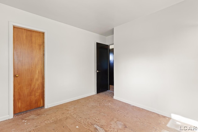 601 N Occidental Rd, Tecumseh, MI 49286 - unfurnished bedroom with baseboards