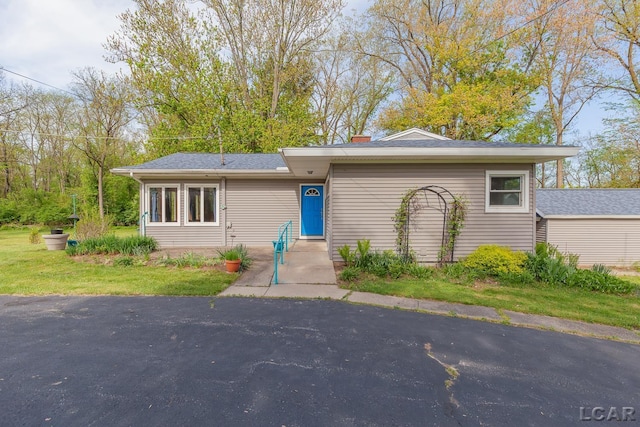 601 N Occidental Rd, Tecumseh, MI 49286 - view of front of home featuring a chimney