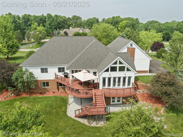 2449 Woodvale Trl, Brighton, MI 48114 - back of property featuring a wooden deck, a shingled roof, a yard, stairway, and french doors
