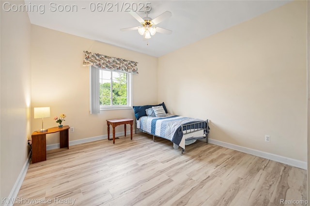 2449 Woodvale Trl, Brighton, MI 48114 - bedroom featuring wood finished floors and ceiling fan