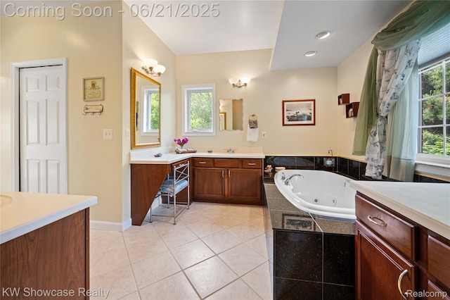 2449 Woodvale Trl, Brighton, MI 48114 - full bath featuring two vanities, a tub with jets, and tile patterned floors