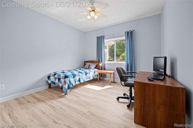 2449 Woodvale Trl, Brighton, MI 48114 - bedroom featuring wood finished floors, an office area, and a ceiling fan