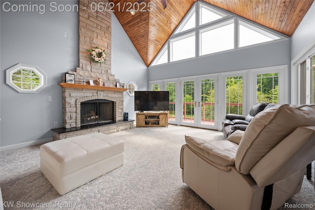 2449 Woodvale Trl, Brighton, MI 48114 - living room featuring wooden ceiling, high vaulted ceiling, carpet floors, a fireplace, and french doors