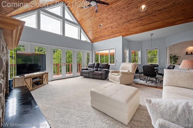 2449 Woodvale Trl, Brighton, MI 48114 - living area featuring high vaulted ceiling, wood ceiling, plenty of natural light, french doors, and a ceiling fan