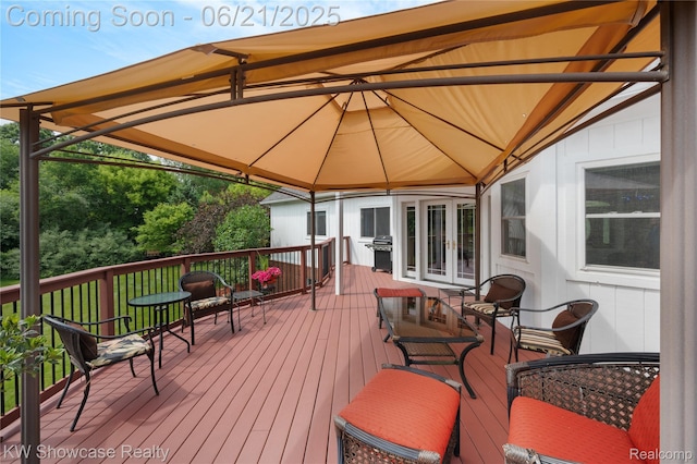 2449 Woodvale Trl, Brighton, MI 48114 - deck featuring a gazebo and grilling area