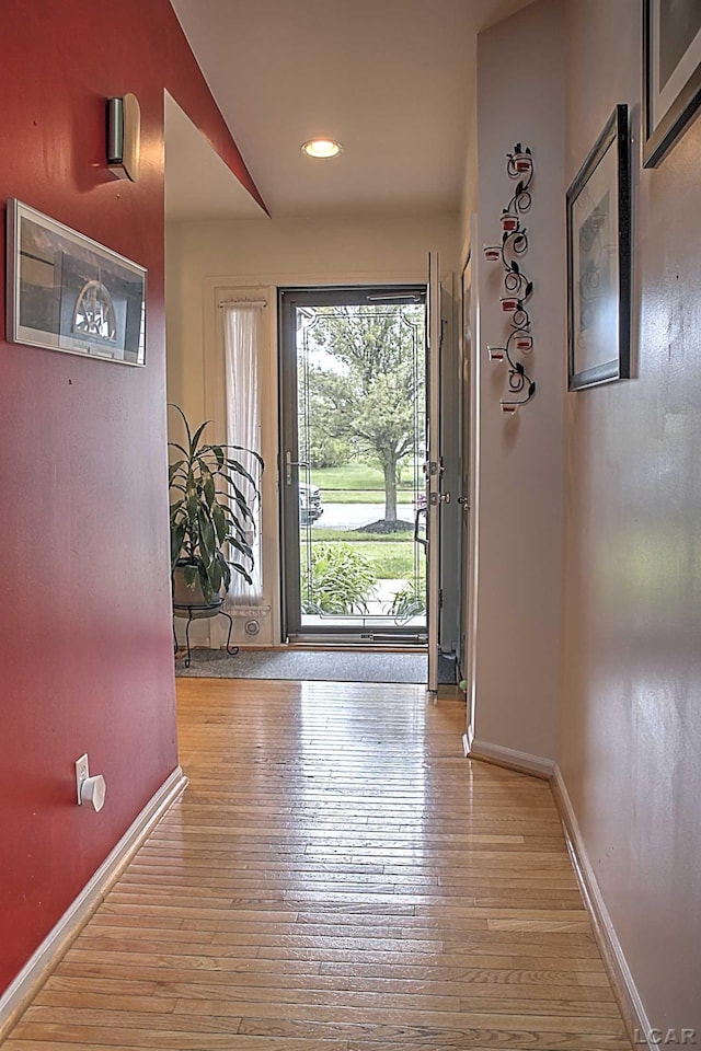 9299 Parkland Dr, Ypsilanti, MI 48197 - foyer with wood-type flooring, baseboards, and recessed lighting