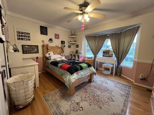 9299 Parkland Dr, Ypsilanti, MI 48197 - bedroom featuring crown molding, light wood finished floors, baseboards, and ceiling fan