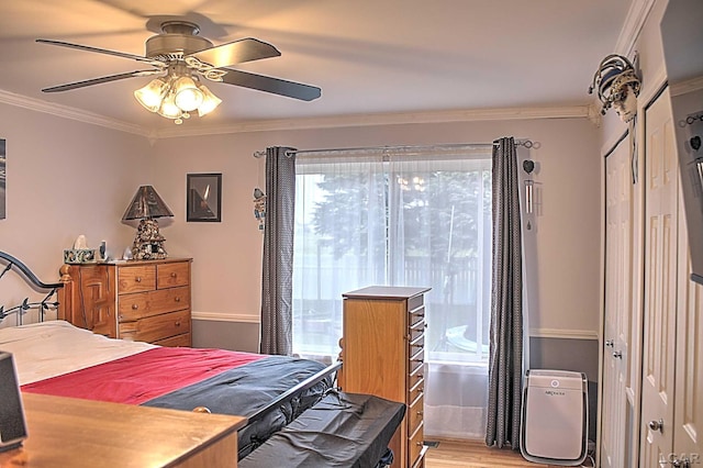 9299 Parkland Dr, Ypsilanti, MI 48197 - bedroom with multiple windows, ornamental molding, light wood-style floors, and a ceiling fan