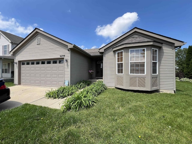 9299 Parkland Dr, Ypsilanti, MI 48197 - ranch-style home featuring a garage, concrete driveway, and a front yard