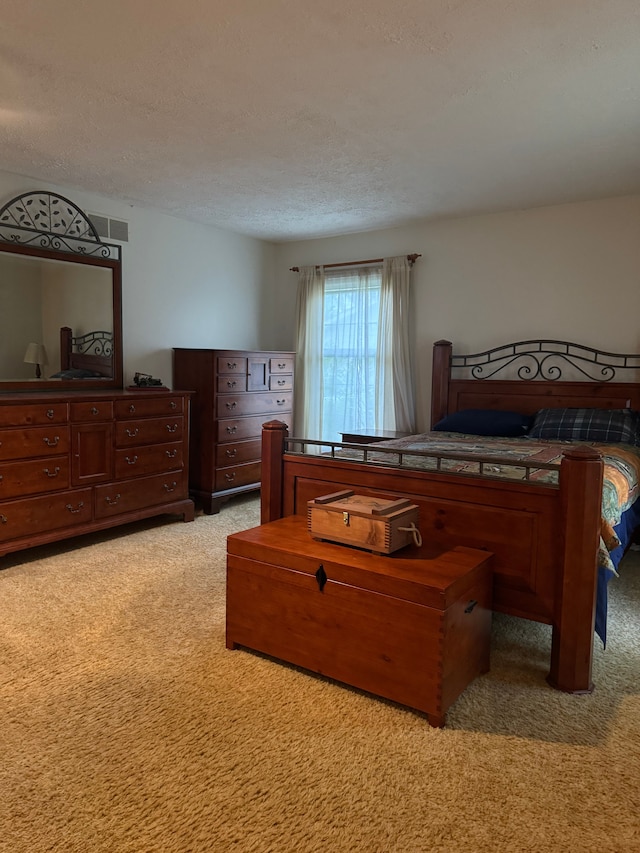 8610 N Waumegah Rd, Clarkston, MI 48348 - bedroom featuring light colored carpet and a textured ceiling