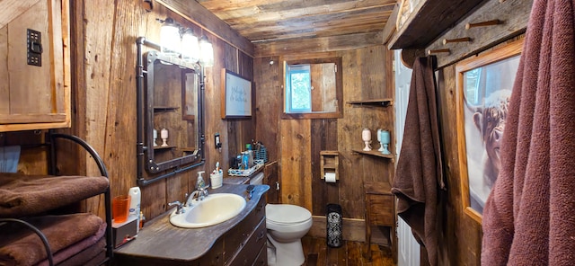 225 Myers Rd, Lapeer, MI 48446 - half bath featuring wooden ceiling, toilet, wood walls, vanity, and wood finished floors