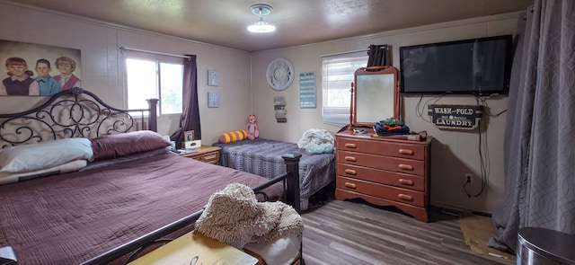 225 Myers Rd, Lapeer, MI 48446 - bedroom with wood finished floors, crown molding, and multiple windows