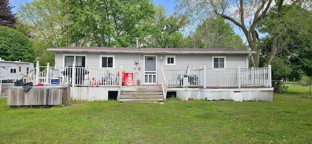 225 Myers Rd, Lapeer, MI 48446 - back of property featuring a deck and a yard