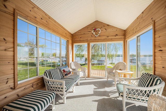 3309 Dumont Lake Dr, Allegan, MI 49010 - sunroom featuring vaulted ceiling, a water view, and healthy amount of natural light