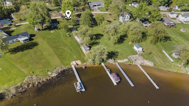 3309 Dumont Lake Dr, Allegan, MI 49010 - aerial view of property and surrounding area featuring a large body of water and nearby suburban area