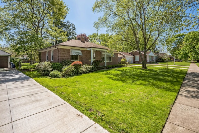 13970 Crosley, Redford, MI 48239 - view of front of property featuring brick siding, a front lawn, and a chimney