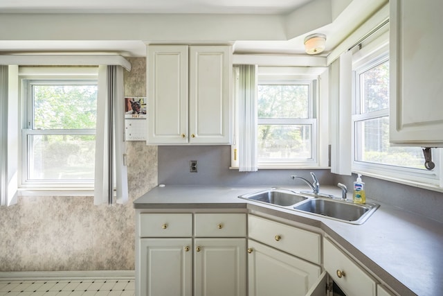13970 Crosley, Redford, MI 48239 - kitchen with a sink, plenty of natural light, white cabinets, and light countertops