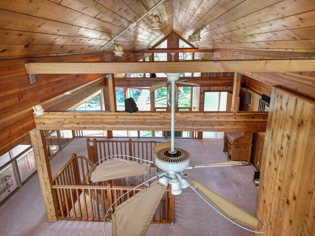 14427 Acorn Cove Trl, Battle Creek, MI 49017 - additional living space featuring wood ceiling, vaulted ceiling, carpet flooring, and ceiling fan