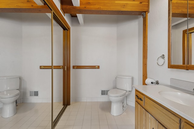 14427 Acorn Cove Trl, Battle Creek, MI 49017 - full bathroom with toilet, tile patterned floors, and vanity