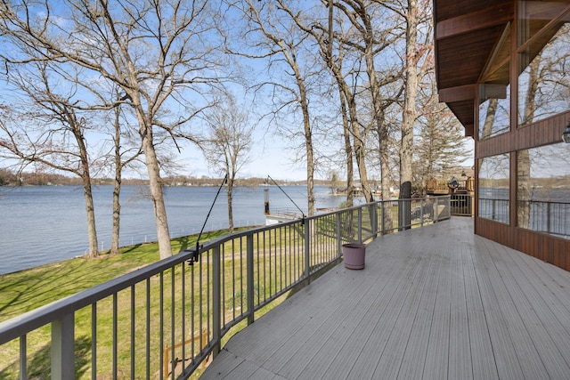 14427 Acorn Cove Trl, Battle Creek, MI 49017 - wooden terrace with a water view and a lawn