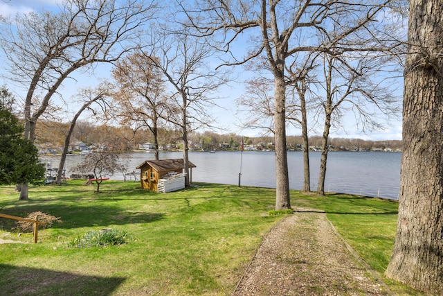 14427 Acorn Cove Trl, Battle Creek, MI 49017 - view of green lawn with a water view and an outbuilding