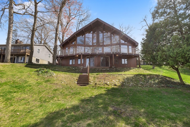 14427 Acorn Cove Trl, Battle Creek, MI 49017 - rear view of property with stairs, a yard, and a wooden deck