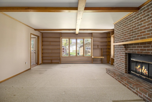 805 E Filer St, Ludington, MI 49431 - unfurnished living room with a fireplace, a baseboard radiator, beam ceiling, carpet floors, and baseboards