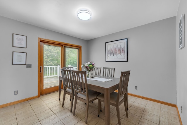 17035 Weber Rd, Holly, MI 48442 - dining space with baseboards and light tile patterned floors
