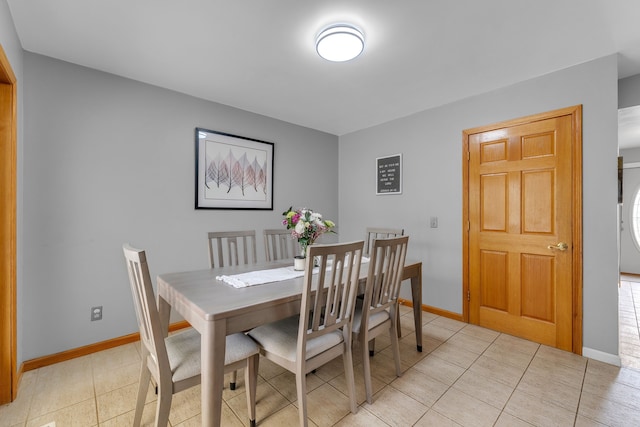 17035 Weber Rd, Holly, MI 48442 - dining space featuring baseboards and light tile patterned flooring