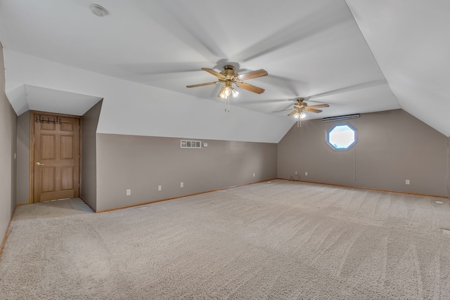 17035 Weber Rd, Holly, MI 48442 - bonus room featuring vaulted ceiling, ceiling fan, carpet flooring, and baseboards