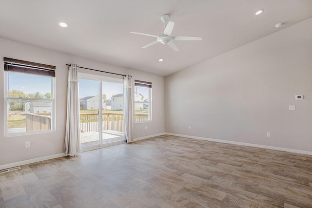 10315 Hatch Ln, Galesburg, MI 49053 - empty room with healthy amount of natural light, ceiling fan, light wood-style flooring, baseboards, and recessed lighting