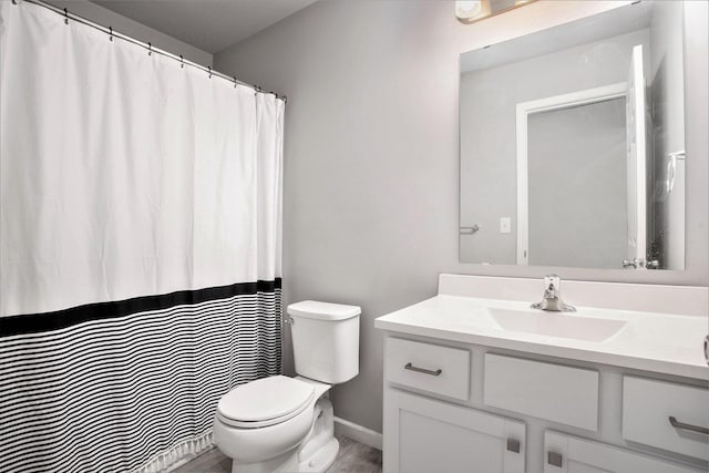 10315 Hatch Ln, Galesburg, MI 49053 - full bath featuring vanity, toilet, and baseboards