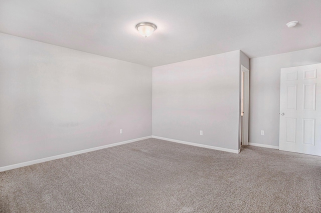 10315 Hatch Ln, Galesburg, MI 49053 - carpeted spare room with baseboards and a smoke detector