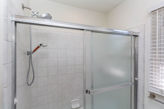 bathroom featuring a stall shower