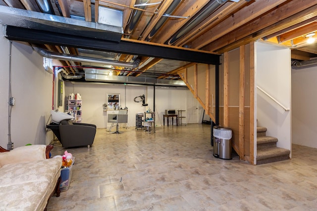 unfinished basement featuring stairway