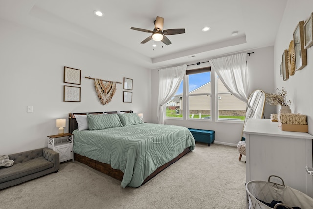 4051 Colfax Ct, Canton, MI 48188 - bedroom featuring a raised ceiling, light colored carpet, recessed lighting, a ceiling fan, and baseboards